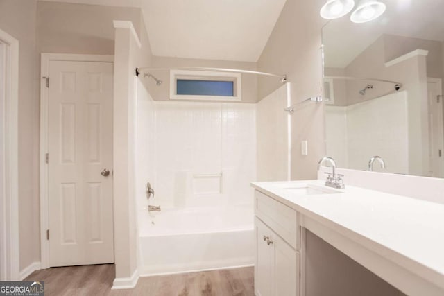 7113 Ambercrest Ct, Austell, GA 30168 - full bath with bathing tub / shower combination, wood finished floors, and vanity