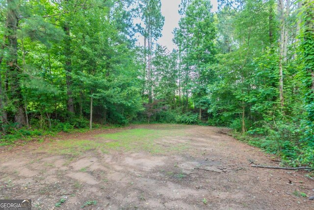 7113 Ambercrest Ct, Austell, GA 30168 - view of yard featuring a forest view