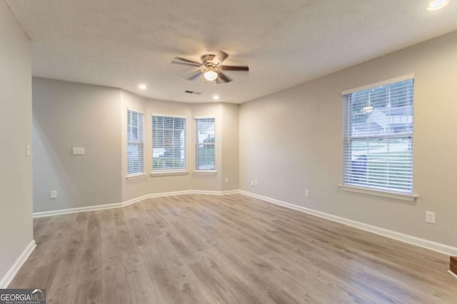 7113 Ambercrest Ct, Austell, GA 30168 - spare room featuring ceiling fan, wood finished floors, and recessed lighting
