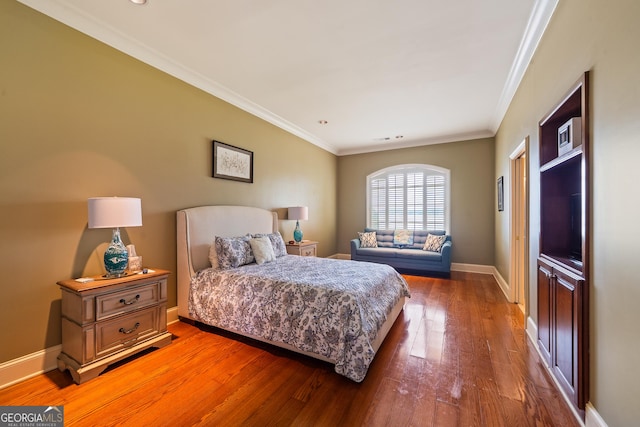 745 Chickasaw Trl S, Sparta, GA 31087 - bedroom with crown molding, light wood-style flooring, and baseboards