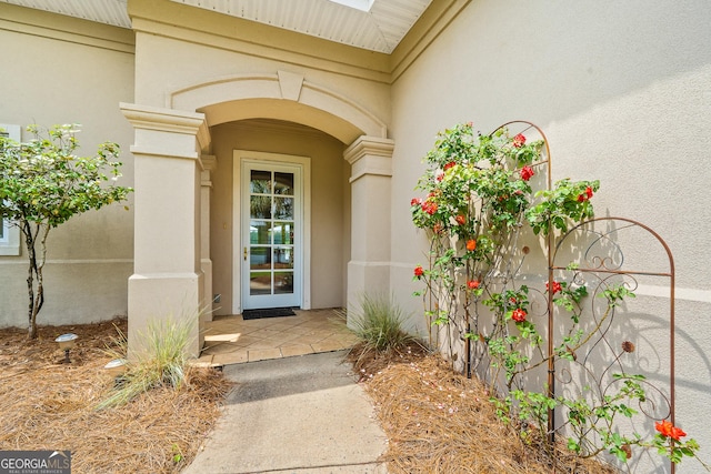 745 Chickasaw Trl S, Sparta, GA 31087 - view of exterior entry featuring stucco siding