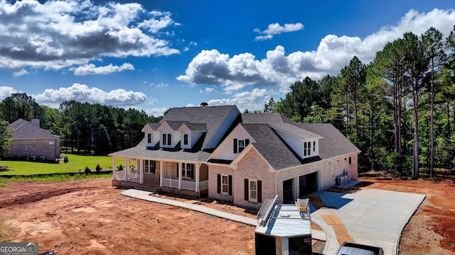 19 Trimble Way SE, Rome, GA 30161 - view of front facade with brick siding, a porch, driveway, and roof with shingles