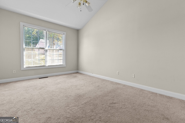 2140 Wildcat Cliffs Way, Lawrenceville, GA 30043 - spare room with ceiling fan, vaulted ceiling, and carpet flooring