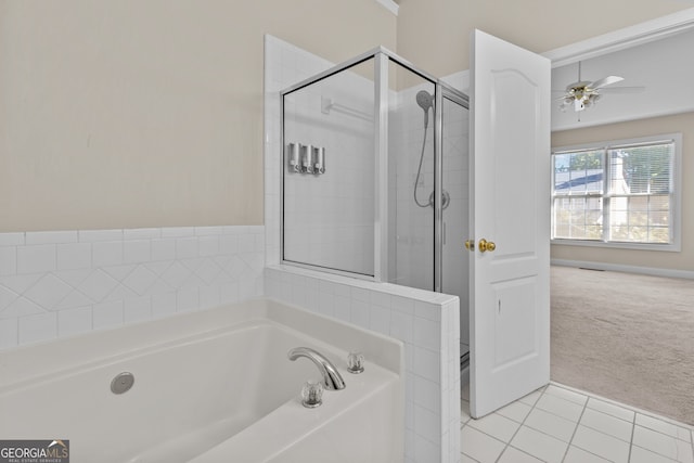 2140 Wildcat Cliffs Way, Lawrenceville, GA 30043 - full bath featuring a bath, a ceiling fan, a shower stall, and tile patterned flooring