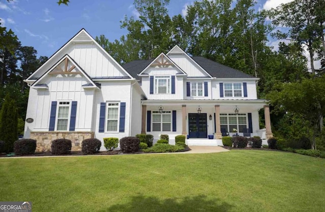 1895 Henley Way, Alpharetta, GA 30009 - view of front of property with board and batten siding, a front yard, a porch, french doors, and stone siding