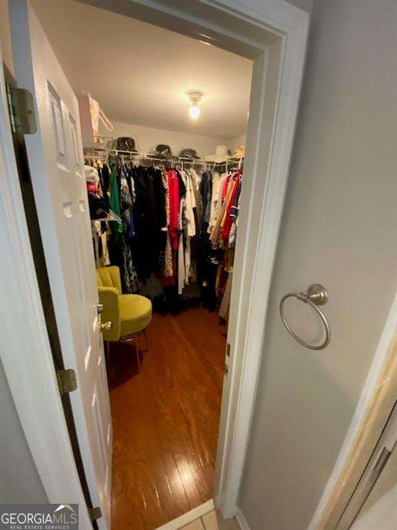 3224 Wolf Club Ln SW, Atlanta, GA 30349 - spacious closet with wood finished floors