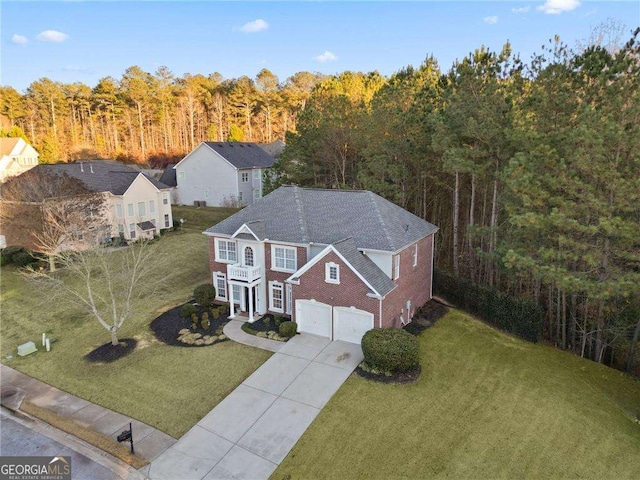 3224 Wolf Club Ln SW, Atlanta, GA 30349 - aerial view of property and surrounding area with a forest