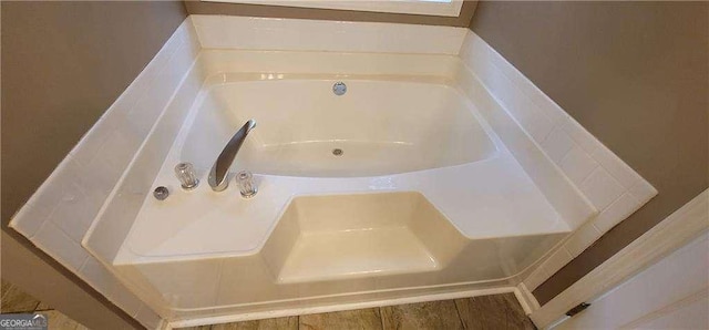 1934 Mcconnell Rd, Grayson, GA 30017 - bathroom featuring a garden tub