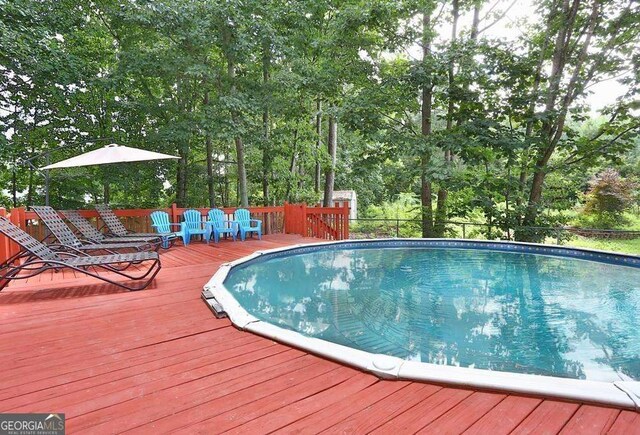 1934 Mcconnell Rd, Grayson, GA 30017 - swimming pool with a deck