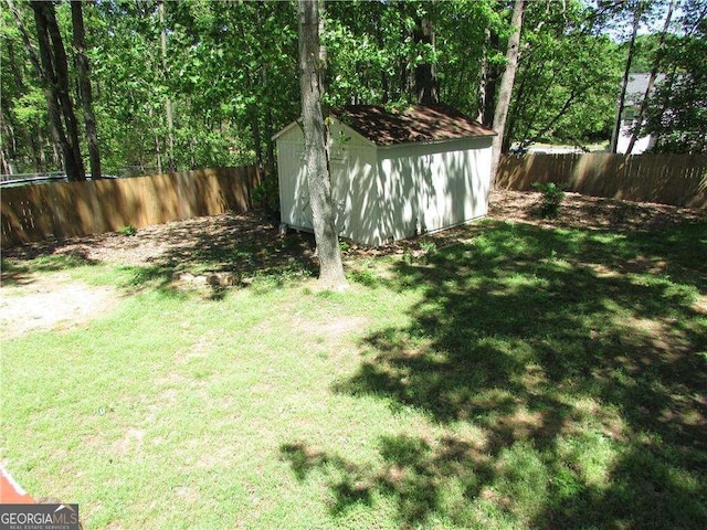 1934 Mcconnell Rd, Grayson, GA 30017 - fenced backyard featuring a storage shed