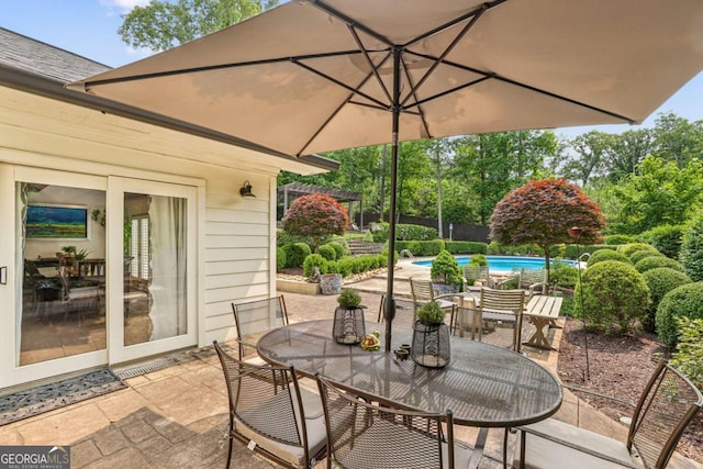 5860 Riverwood Dr, Sandy Springs, GA 30328 - view of patio featuring outdoor dining area