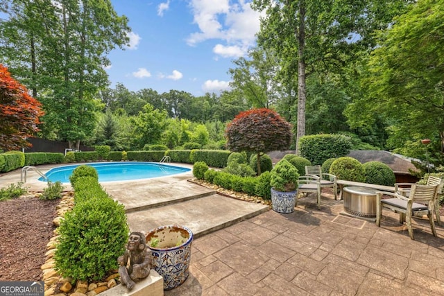 5860 Riverwood Dr, Sandy Springs, GA 30328 - view of swimming pool featuring a patio