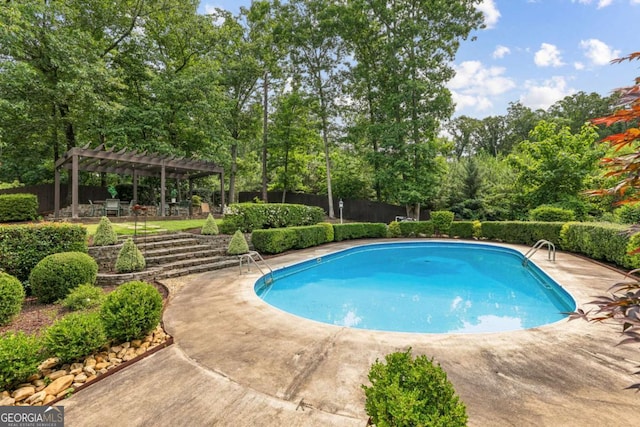 5860 Riverwood Dr, Sandy Springs, GA 30328 - view of pool with a pergola, a patio, and view of scattered trees