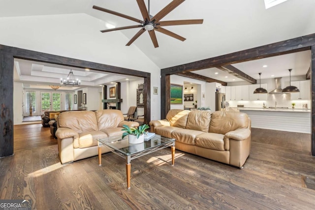 5860 Riverwood Dr, Sandy Springs, GA 30328 - living room featuring dark wood finished floors, ceiling fan, a chandelier, lofted ceiling, and recessed lighting
