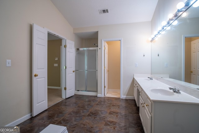 2938 Cottesford Way SE, Smyrna, GA 30080 - bathroom featuring a shower stall, double vanity, and vaulted ceiling