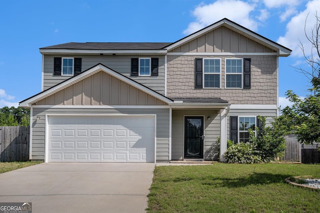 1776 Cheryl Ave, Griffin, GA 30224 - view of front of property with driveway, board and batten siding, and a garage
