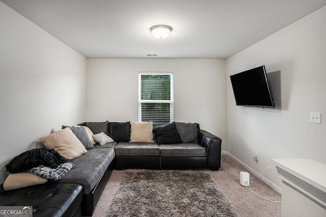 1776 Cheryl Ave, Griffin, GA 30224 - living area featuring carpet floors and baseboards