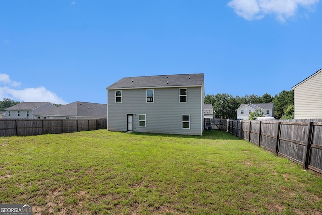 1776 Cheryl Ave, Griffin, GA 30224 - rear view of house with a fenced backyard
