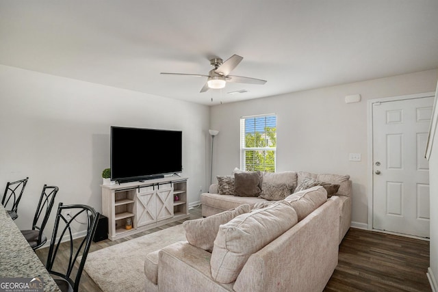 1776 Cheryl Ave, Griffin, GA 30224 - living room featuring ceiling fan and dark wood-style flooring