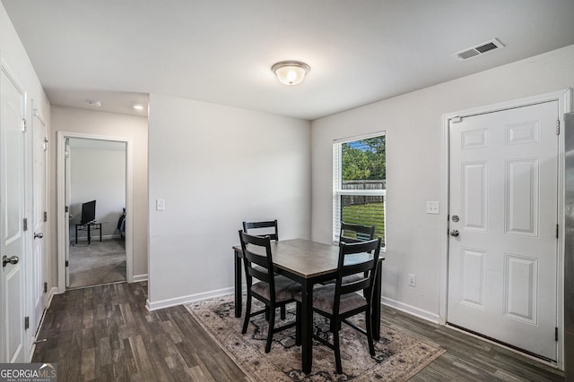 1776 Cheryl Ave, Griffin, GA 30224 - dining area with dark wood finished floors and recessed lighting