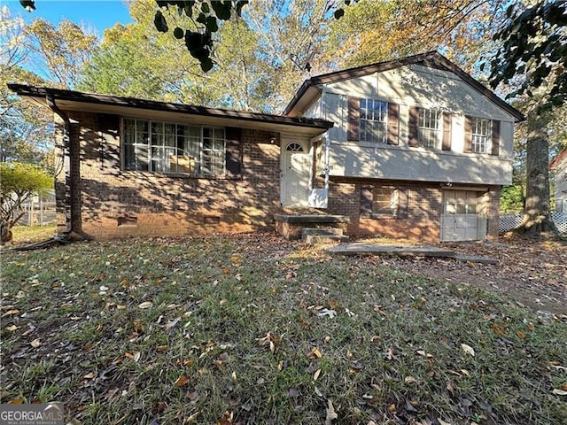 8423 Avalon Dr, Riverdale, GA 30274 - view of side of home with brick siding, crawl space, and a garage