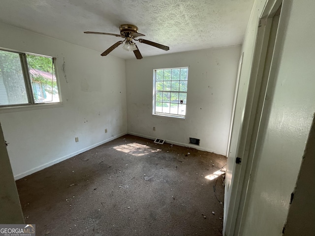 8423 Avalon Dr, Riverdale, GA 30274 - empty room featuring a ceiling fan and baseboards