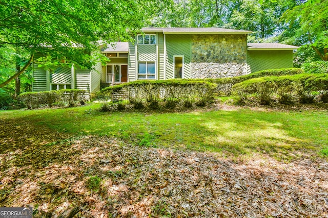 8120 Ball Mill Rd, Atlanta, GA 30350 - view of front of house featuring stone siding and a front lawn