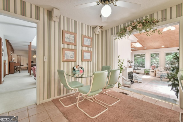 8120 Ball Mill Rd, Atlanta, GA 30350 - tiled dining room with wallpapered walls, a ceiling fan, and carpet flooring