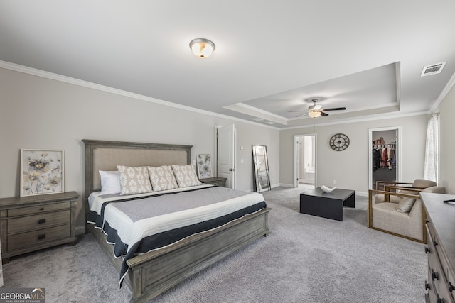 830 Tom Miller Rd, Bethlehem, GA 30620 - bedroom featuring carpet flooring, a tray ceiling, baseboards, ornamental molding, and a walk in closet