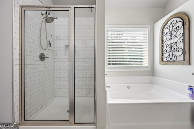 830 Tom Miller Rd, Bethlehem, GA 30620 - bathroom with a stall shower and a garden tub