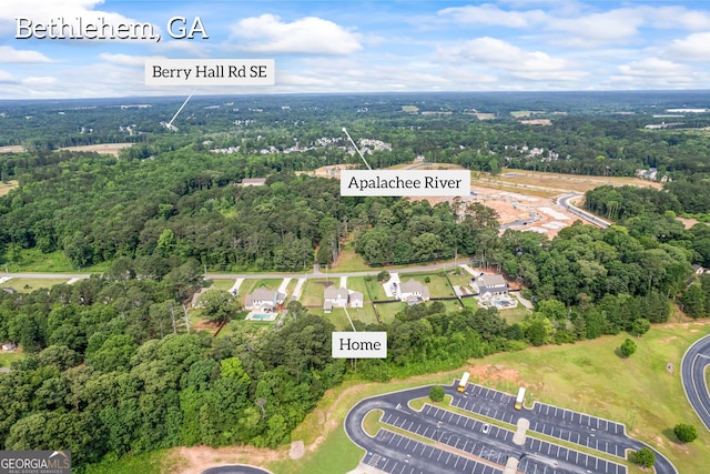 830 Tom Miller Rd, Bethlehem, GA 30620 - aerial overview of property's location featuring a heavily wooded area