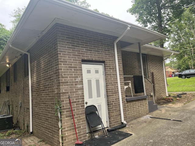 2526 Kensington Rd, Macon, GA 31211 - entrance to property with brick siding and central AC unit