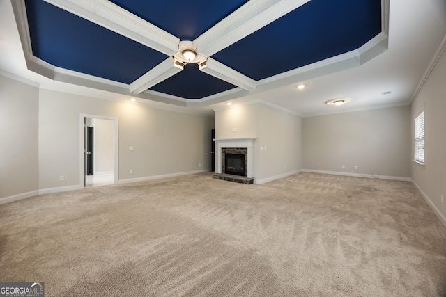 703 Burch Creek Dr, Grovetown, GA 30813 - unfurnished living room featuring light carpet, a glass covered fireplace, coffered ceiling, ornamental molding, and ceiling fan