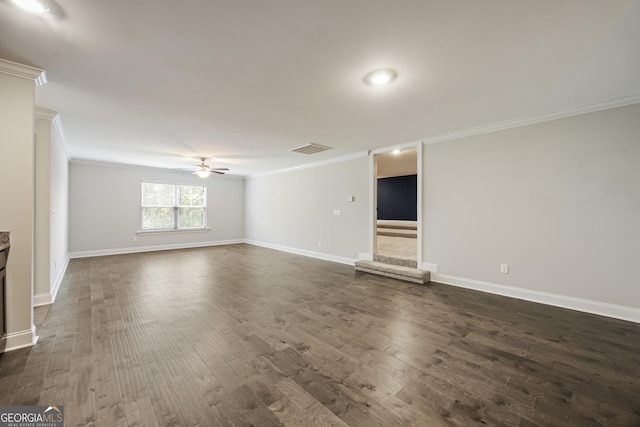 703 Burch Creek Dr, Grovetown, GA 30813 - unfurnished living room with ornamental molding, ceiling fan, dark wood finished floors, and stairway