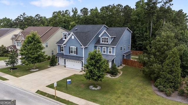 703 Burch Creek Dr, Grovetown, GA 30813 - traditional-style home with concrete driveway, a garage, and a standing seam roof