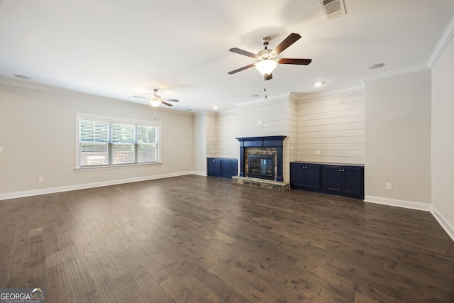703 Burch Creek Dr, Grovetown, GA 30813 - unfurnished living room with ceiling fan, dark wood-type flooring, a stone fireplace, crown molding, and recessed lighting