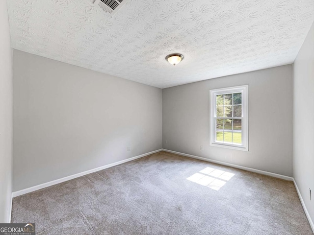 30 Court S, Ellenwood, GA 30294 - carpeted empty room featuring baseboards and a textured ceiling