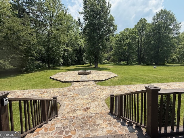 33 T J Mote Rd, Dahlonega, GA 30533 - view of grassy yard with a fire pit and a patio area