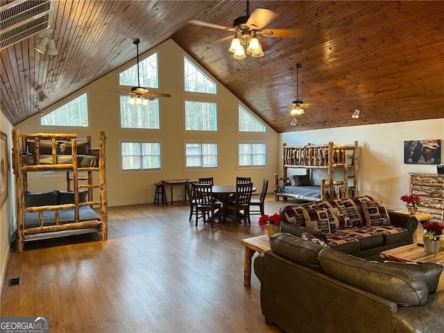 33 T J Mote Rd, Dahlonega, GA 30533 - living area with ceiling fan, wood ceiling, high vaulted ceiling, wood finished floors, and baseboards