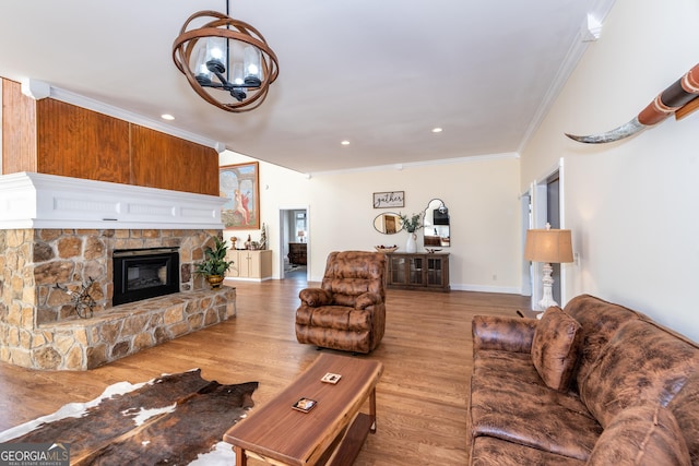 33 T J Mote Rd, Dahlonega, GA 30533 - living area featuring crown molding, a fireplace, wood finished floors, a chandelier, and recessed lighting