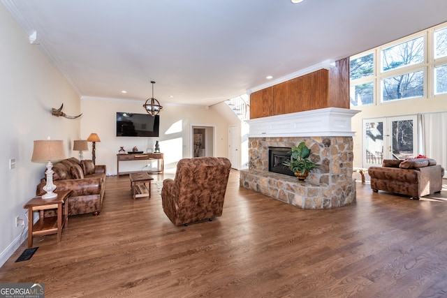 33 T J Mote Rd, Dahlonega, GA 30533 - living area featuring crown molding, dark wood finished floors, a fireplace, recessed lighting, and baseboards