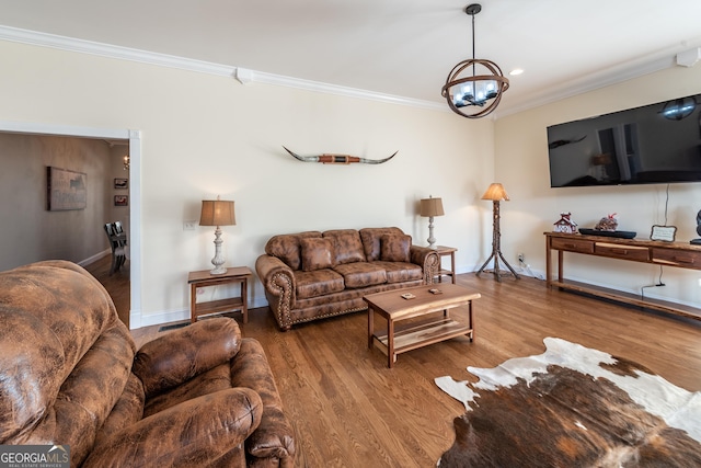 33 T J Mote Rd, Dahlonega, GA 30533 - living area featuring crown molding, a chandelier, wood finished floors, and baseboards
