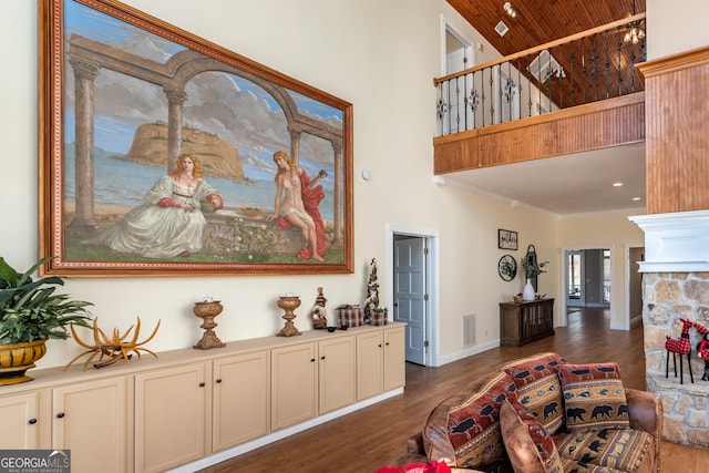 33 T J Mote Rd, Dahlonega, GA 30533 - living room featuring a high ceiling, dark wood-type flooring, wooden ceiling, and crown molding