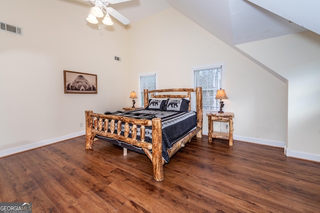 33 T J Mote Rd, Dahlonega, GA 30533 - bedroom featuring wood finished floors, baseboards, high vaulted ceiling, and a ceiling fan
