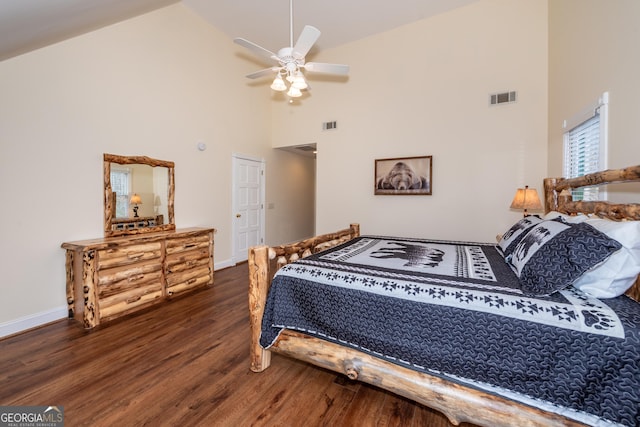 33 T J Mote Rd, Dahlonega, GA 30533 - bedroom with high vaulted ceiling, wood finished floors, baseboards, and ceiling fan