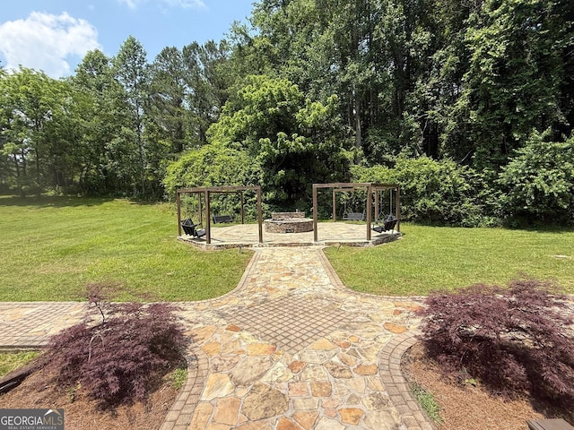 33 T J Mote Rd, Dahlonega, GA 30533 - view of grassy yard with a patio and a fire pit