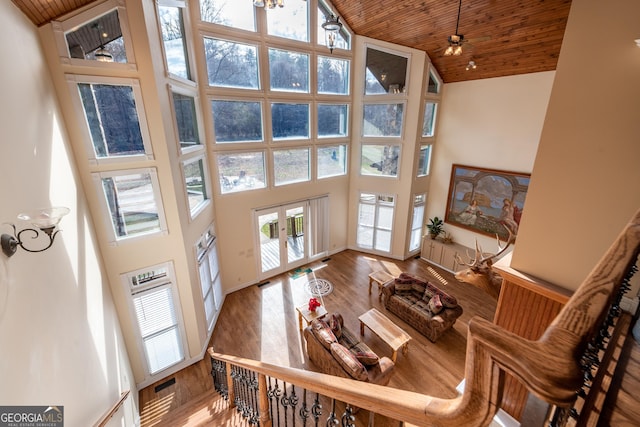 33 T J Mote Rd, Dahlonega, GA 30533 - living area featuring high vaulted ceiling, wood ceiling, french doors, wood finished floors, and baseboards