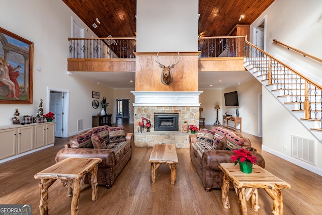 33 T J Mote Rd, Dahlonega, GA 30533 - living room with high vaulted ceiling, wood ceiling, stairs, baseboards, and wood finished floors
