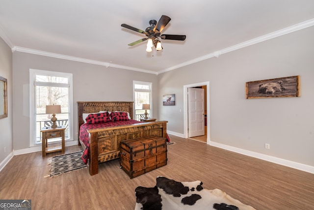 33 T J Mote Rd, Dahlonega, GA 30533 - bedroom with ornamental molding, wood finished floors, baseboards, and ceiling fan