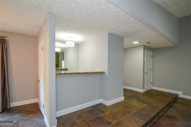 4766 Jamerson Forest Cir, Marietta, GA 30066 - empty room with stone tile flooring and a textured ceiling